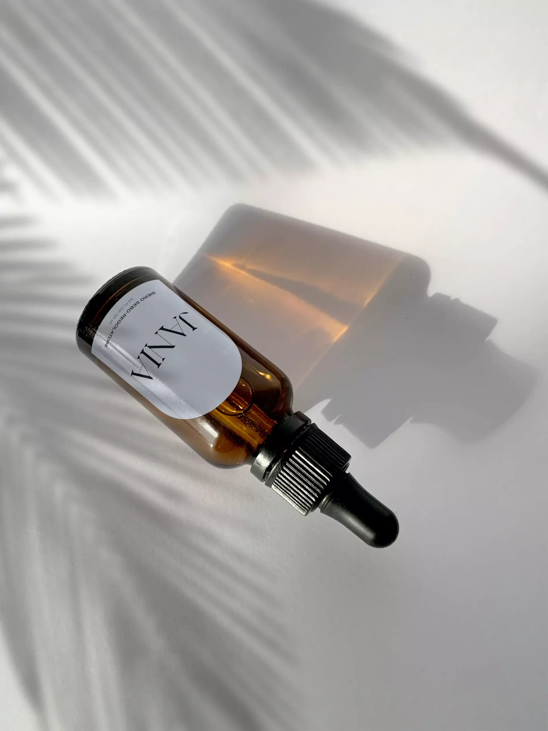 Brand Identity for Jania - Amber Dropper Packaging Design